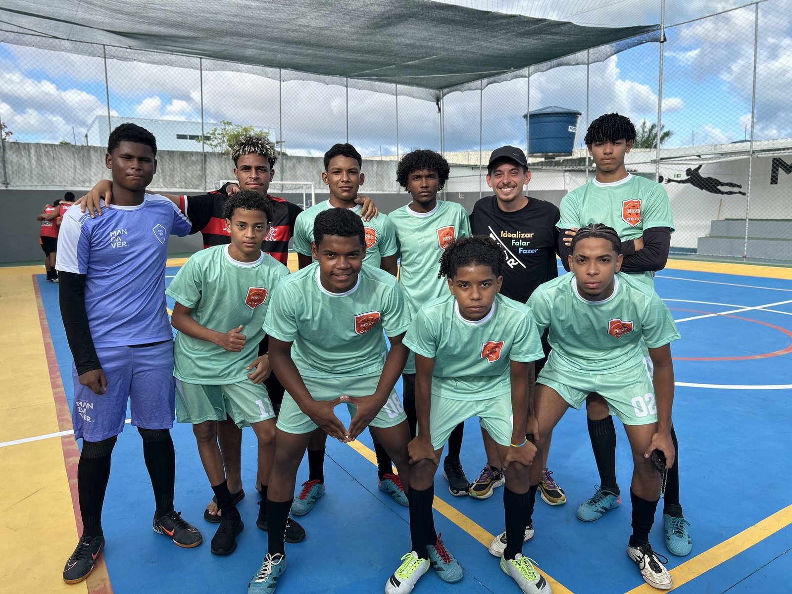 The institute's grassroots team gathered on the court
